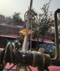 吊運機成為農(nóng)村往房上吊玉米的機器